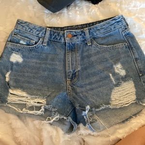 ripped blue jean shorts